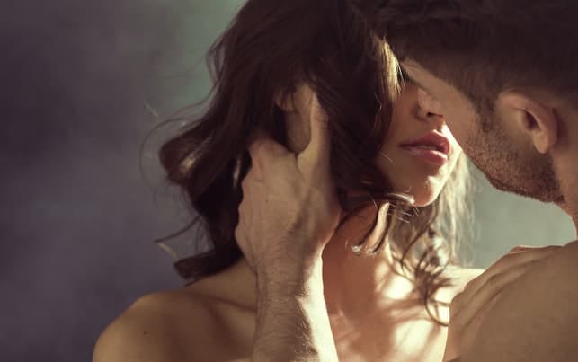 a couple kissing romantically