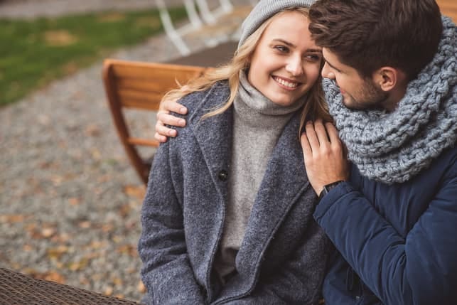 a couple is having a date in autumn