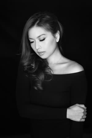 a black-and-while portrait of an asian girl