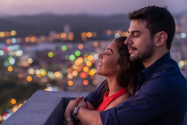 a Hispanic couple is having a beautiful evening date