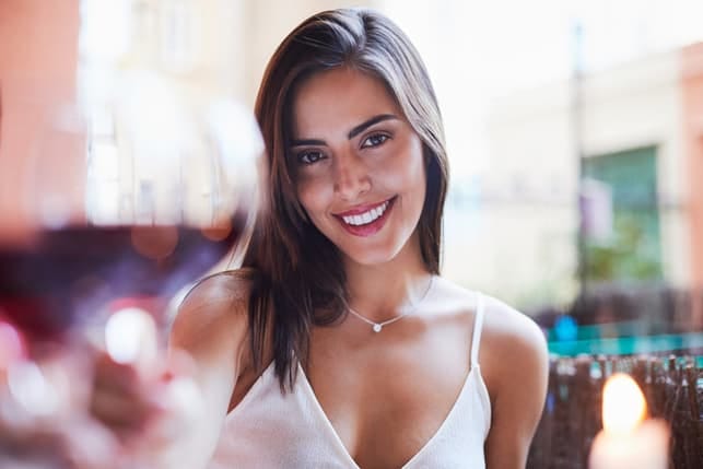 a beautiful young woman smiling