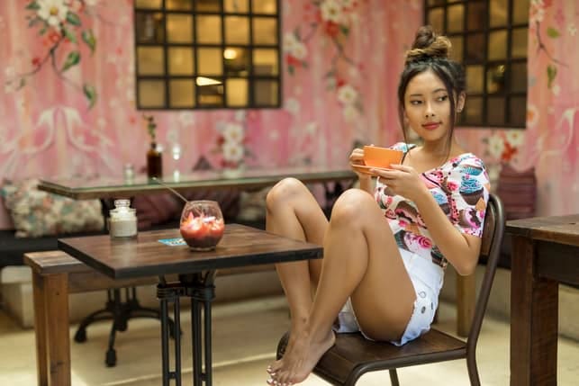 a chinese girl drinking tea