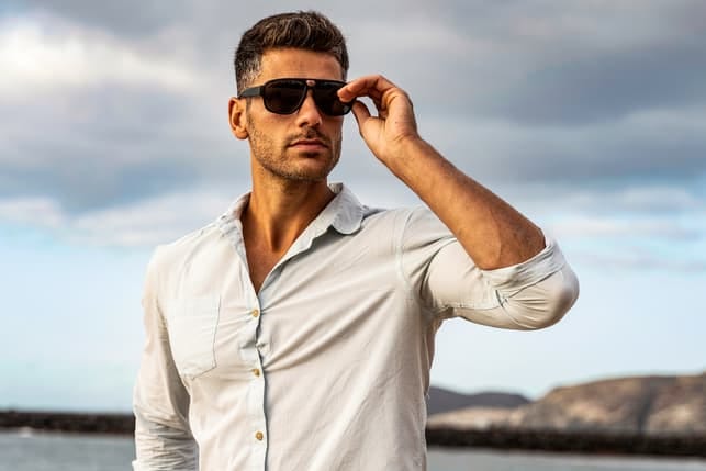 a portrait of a man wearing sunglasses