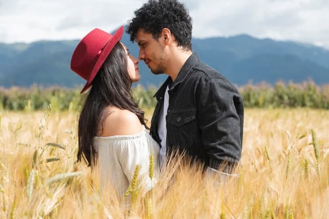 a couple enjoying their date in the field
