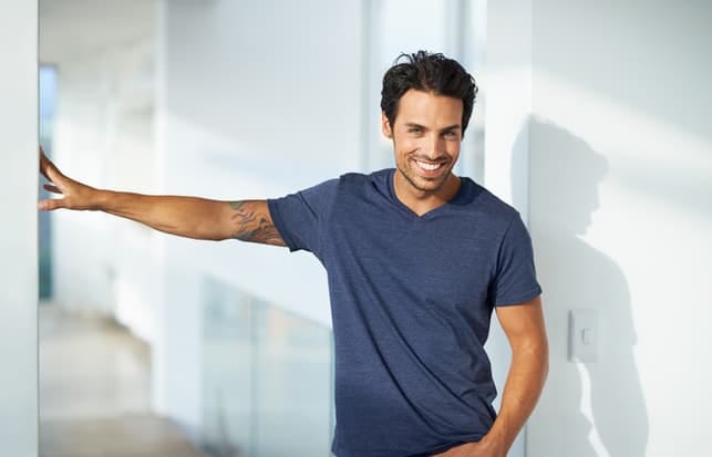 a portrait of a handsome man smiling